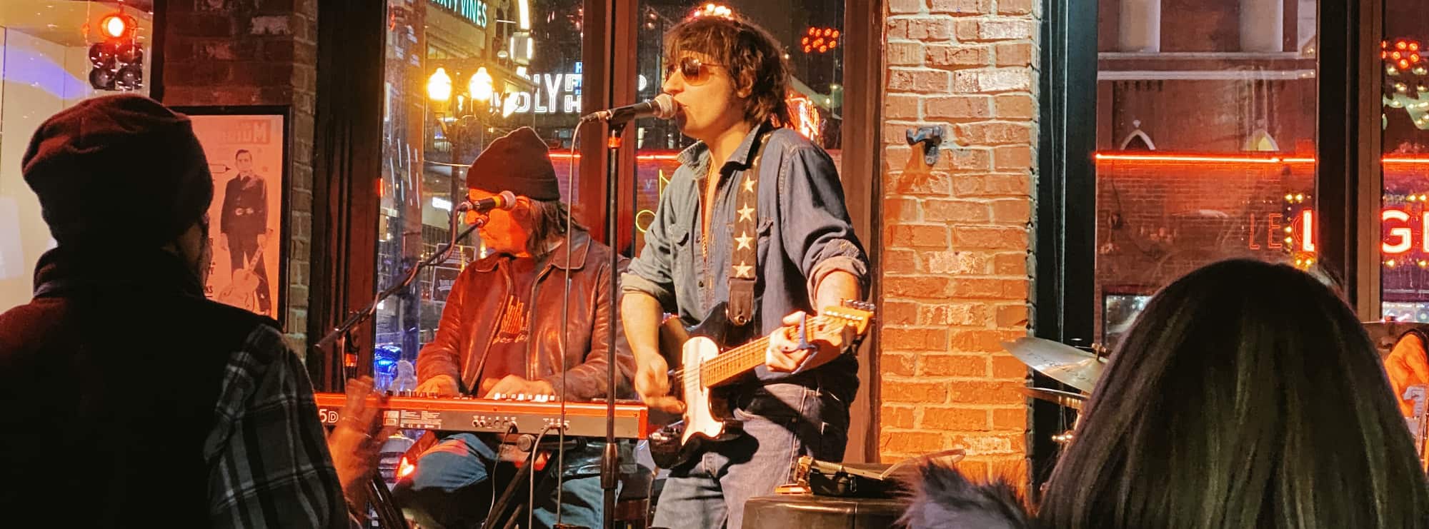 bar singer on guitar in Charleston